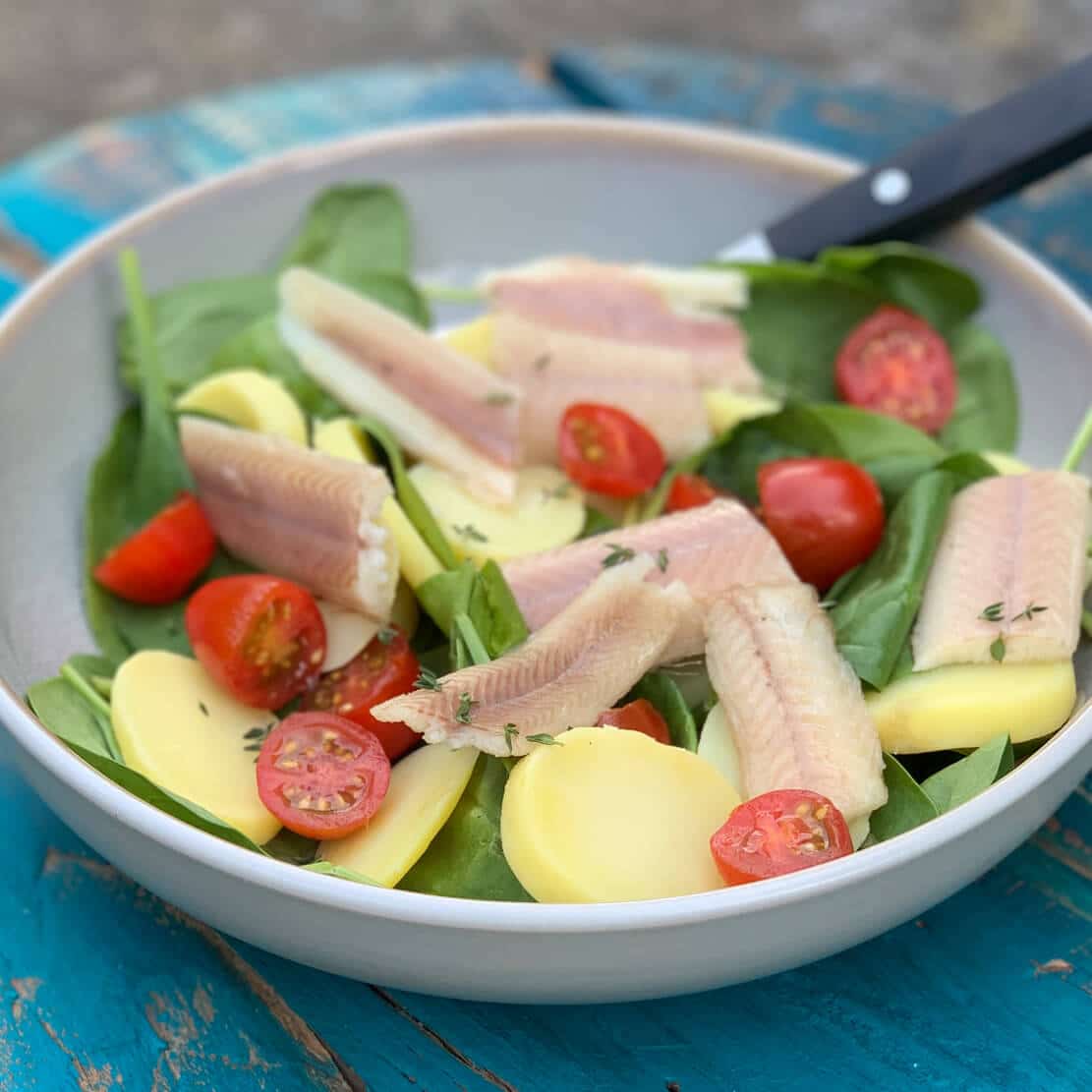 lauwwarme salade met paling en spinazie